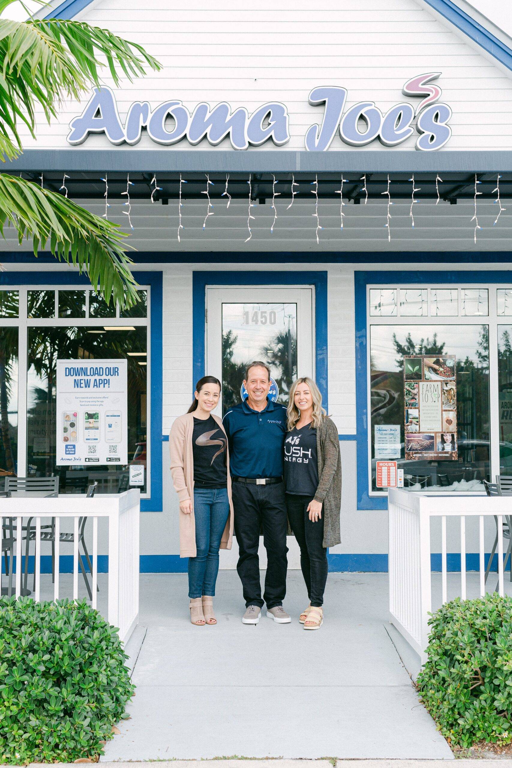 A picture of an Aroma Joe’s franchisee and his two daughters.