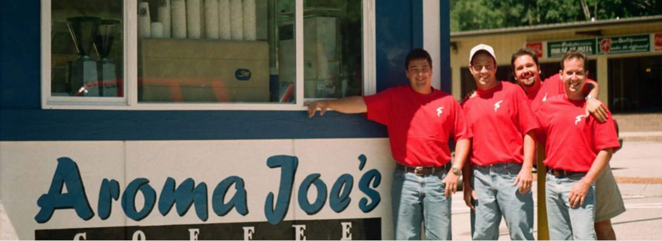 a picture of the first-ever Aroma Joe’s in East Rochester, NH, with founders Marty and Tim McKenna and Mike and Brian Sillon.